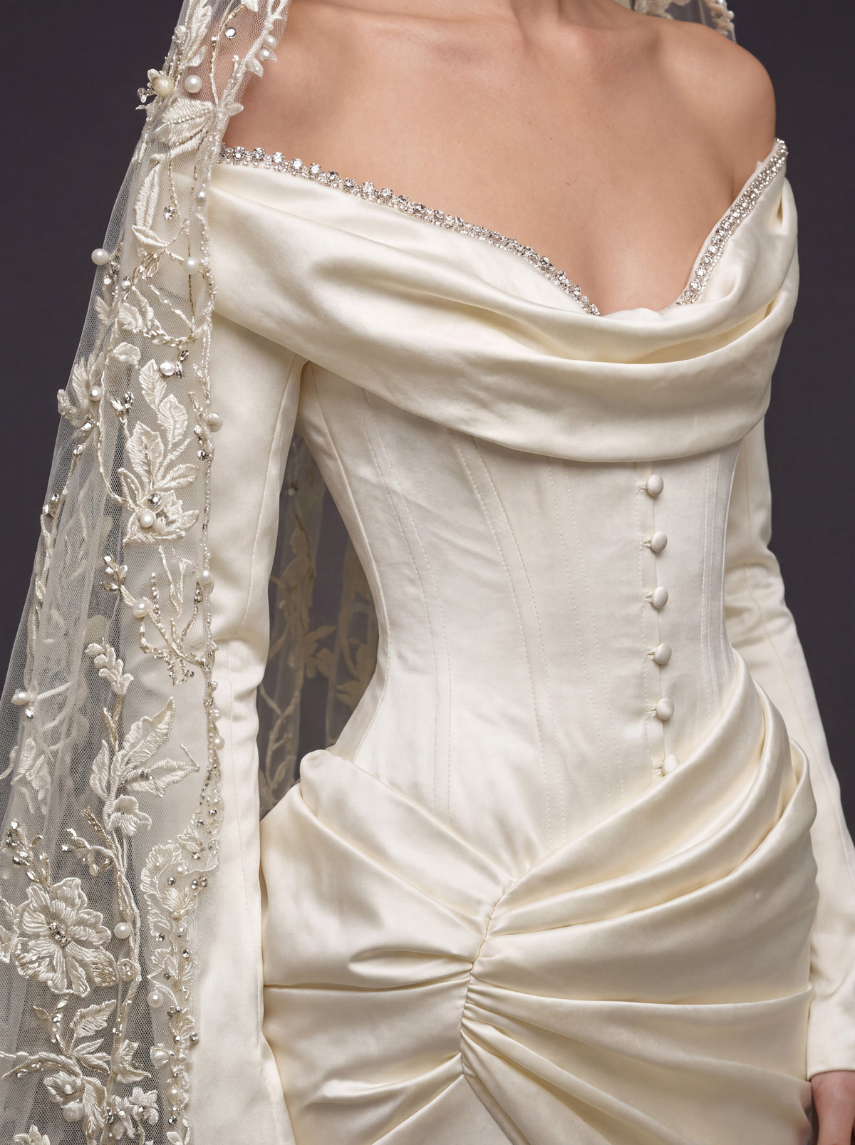 Champagne Satin Draped Mermaid Wedding Gown – Off-the-Shoulder Cowl Neckline, Pearl Button Corset, Front Slit & Floral Cathedral Veil