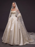 Pearl Ivory Satin Basque Waist Ball Gown Wedding Dress – Draped Strapless Neckline, Detachable Puff Sleeves & Embroidered Cathedral Veil
