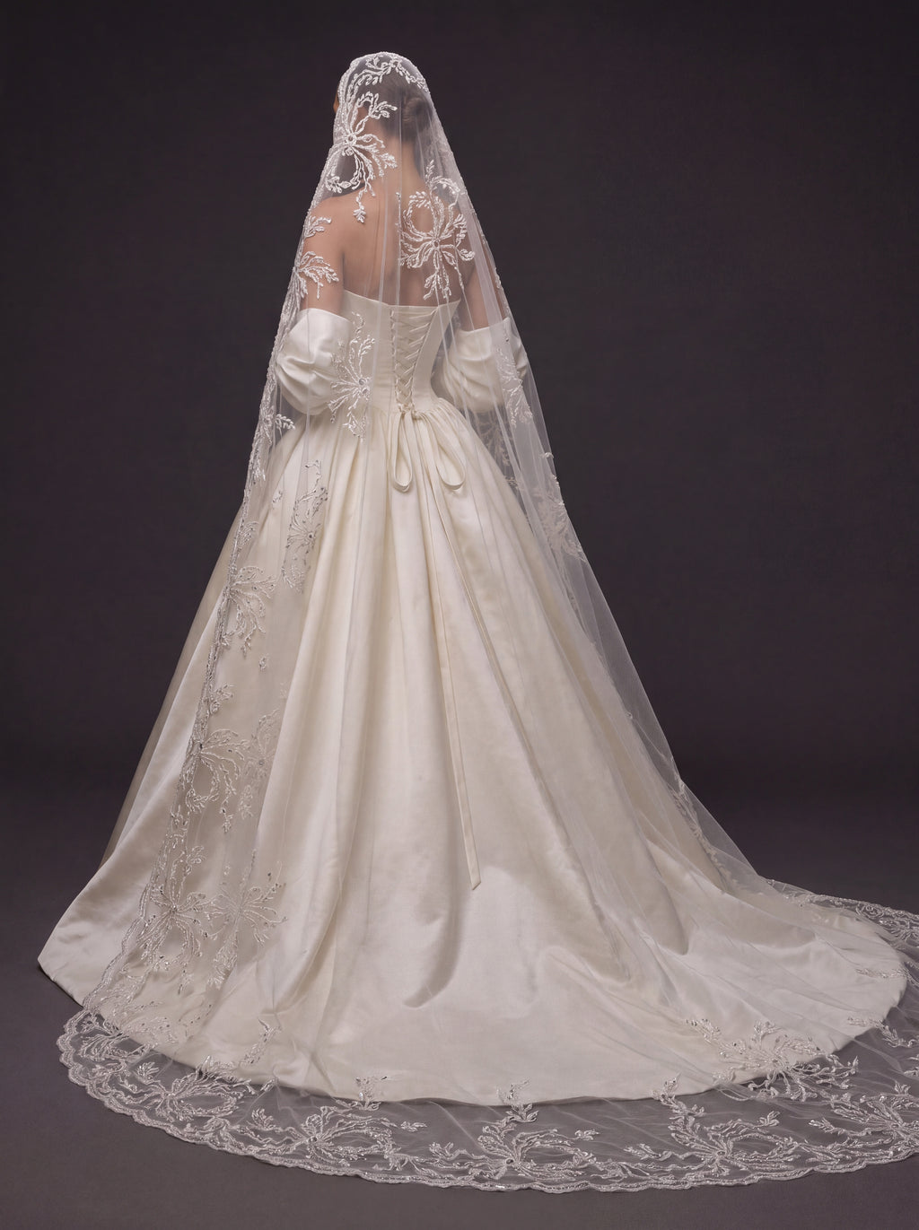 Pearl Ivory Satin Basque Waist Ball Gown Wedding Dress – Draped Strapless Neckline, Detachable Puff Sleeves & Embroidered Cathedral Veil