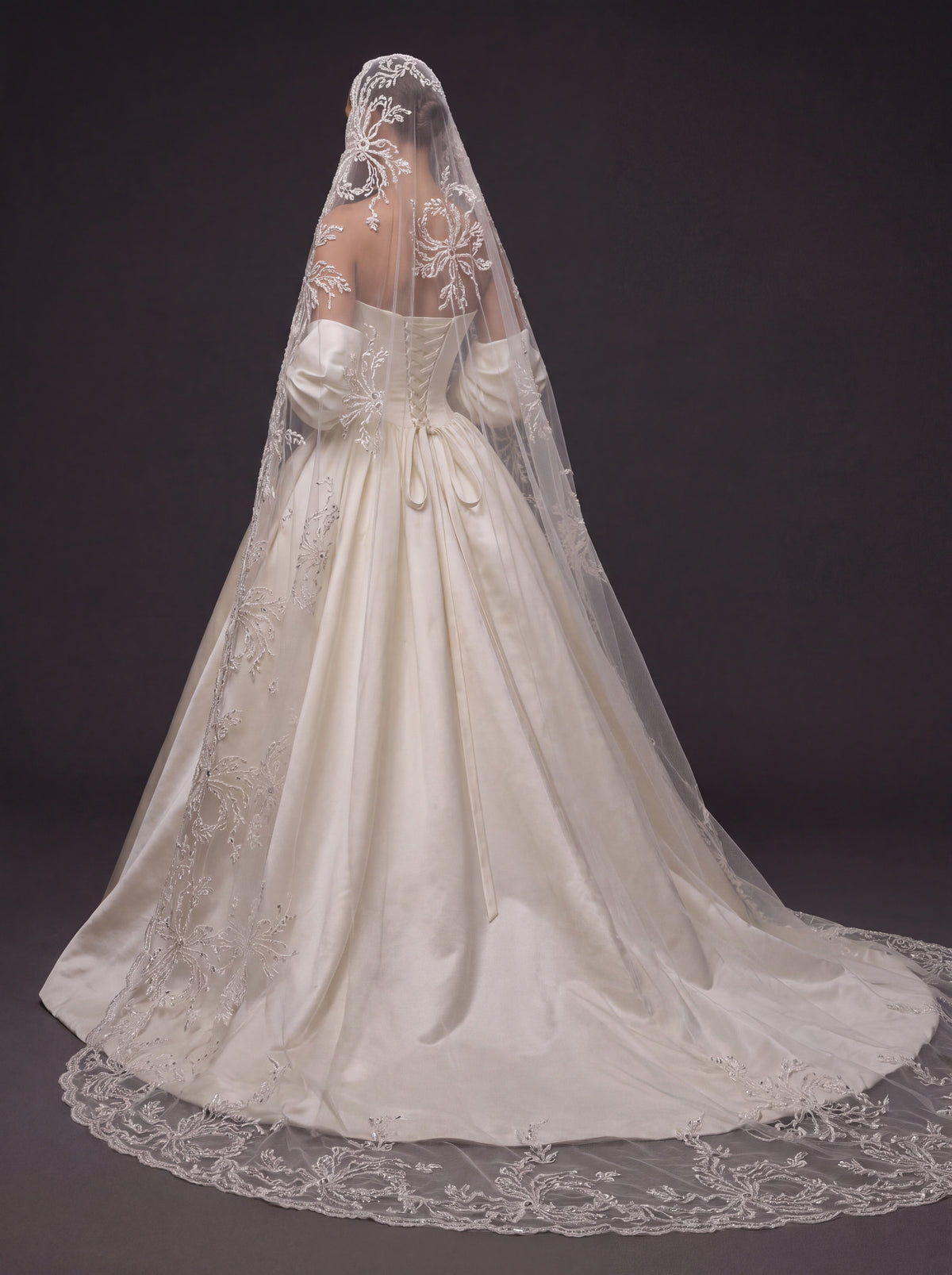 Pearl Ivory Satin Basque Waist Ball Gown Wedding Dress – Draped Strapless Neckline, Detachable Puff Sleeves & Embroidered Cathedral Veil