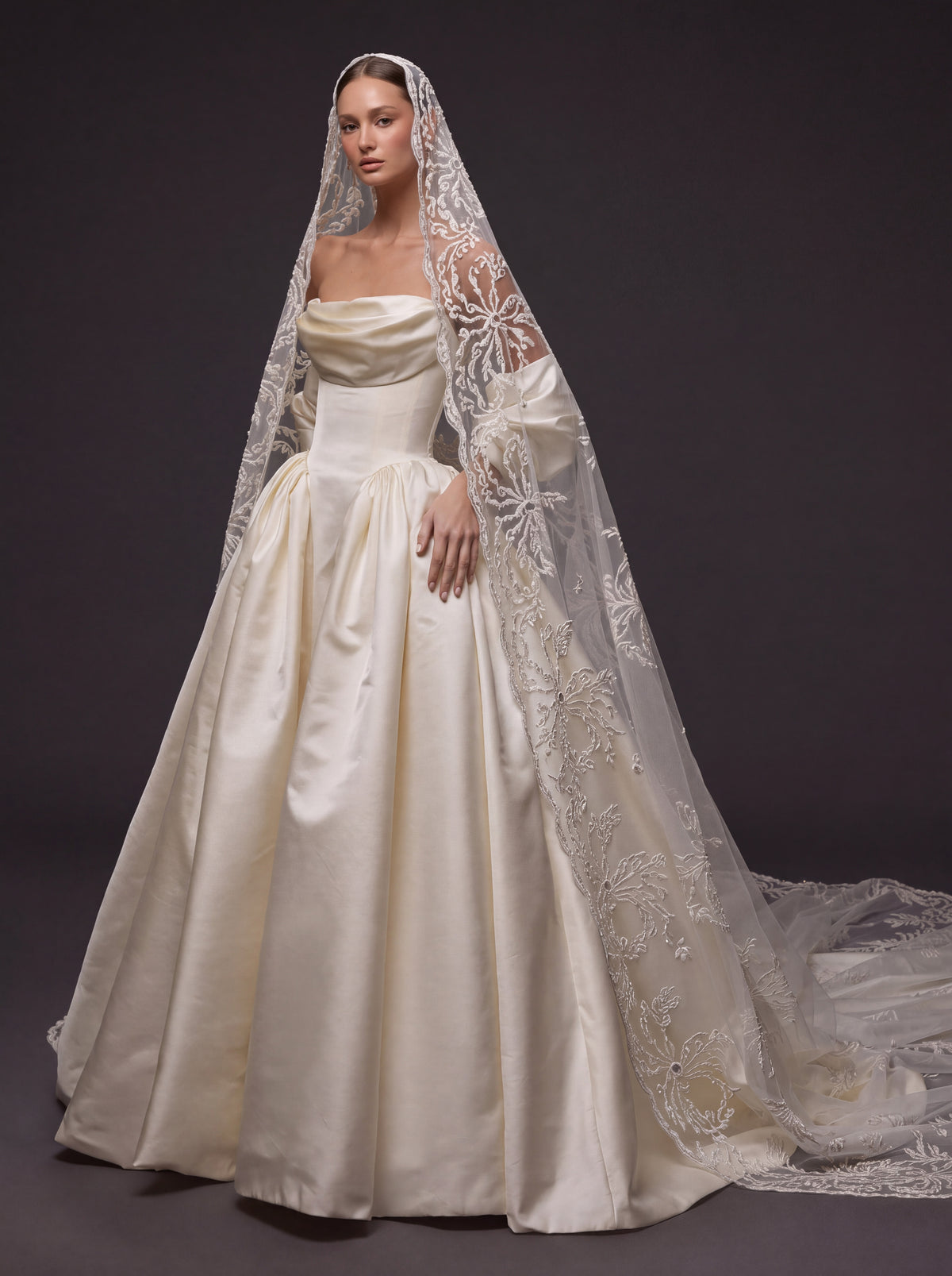 Pearl Ivory Satin Basque Waist Ball Gown Wedding Dress – Draped Strapless Neckline, Detachable Puff Sleeves & Embroidered Cathedral Veil